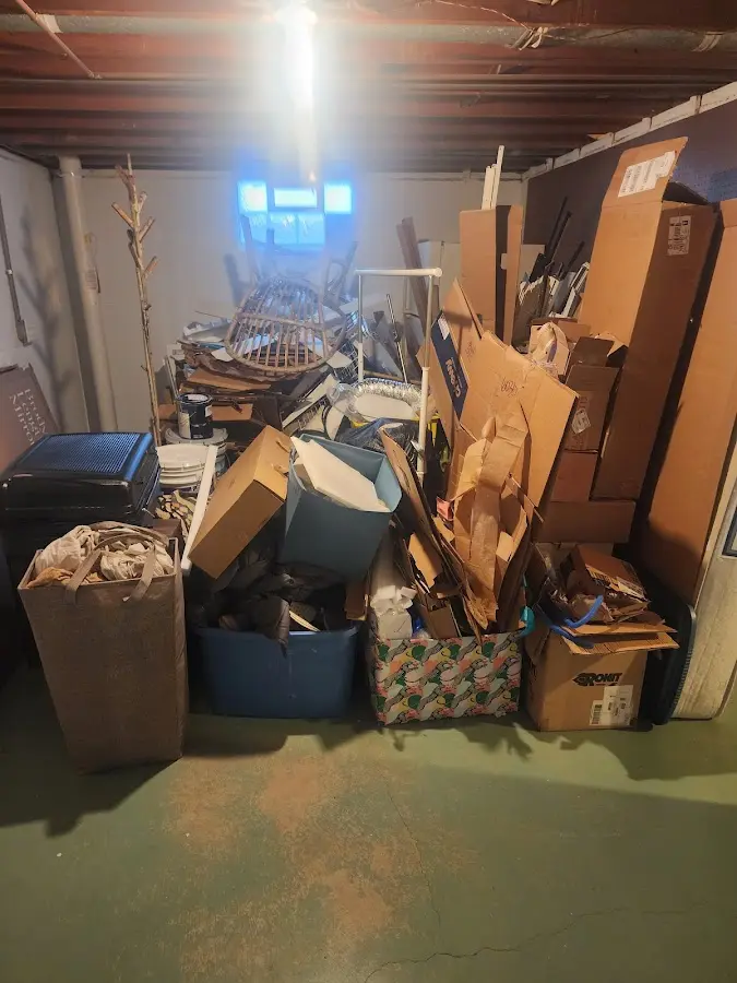 Roll-off dumpster container at job site for Yard Waste Dumpster Rental in Peshtigo